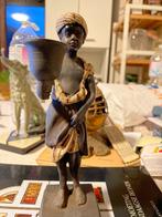 Een gietijzeren kandelaar / beeldje van een Moorse jongen., Antiek en Kunst, Ophalen of Verzenden