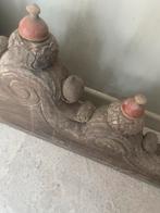 Zwaar houten ornament, Ophalen