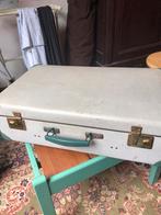 Grote grijs-beige reiskoffer, Ophalen