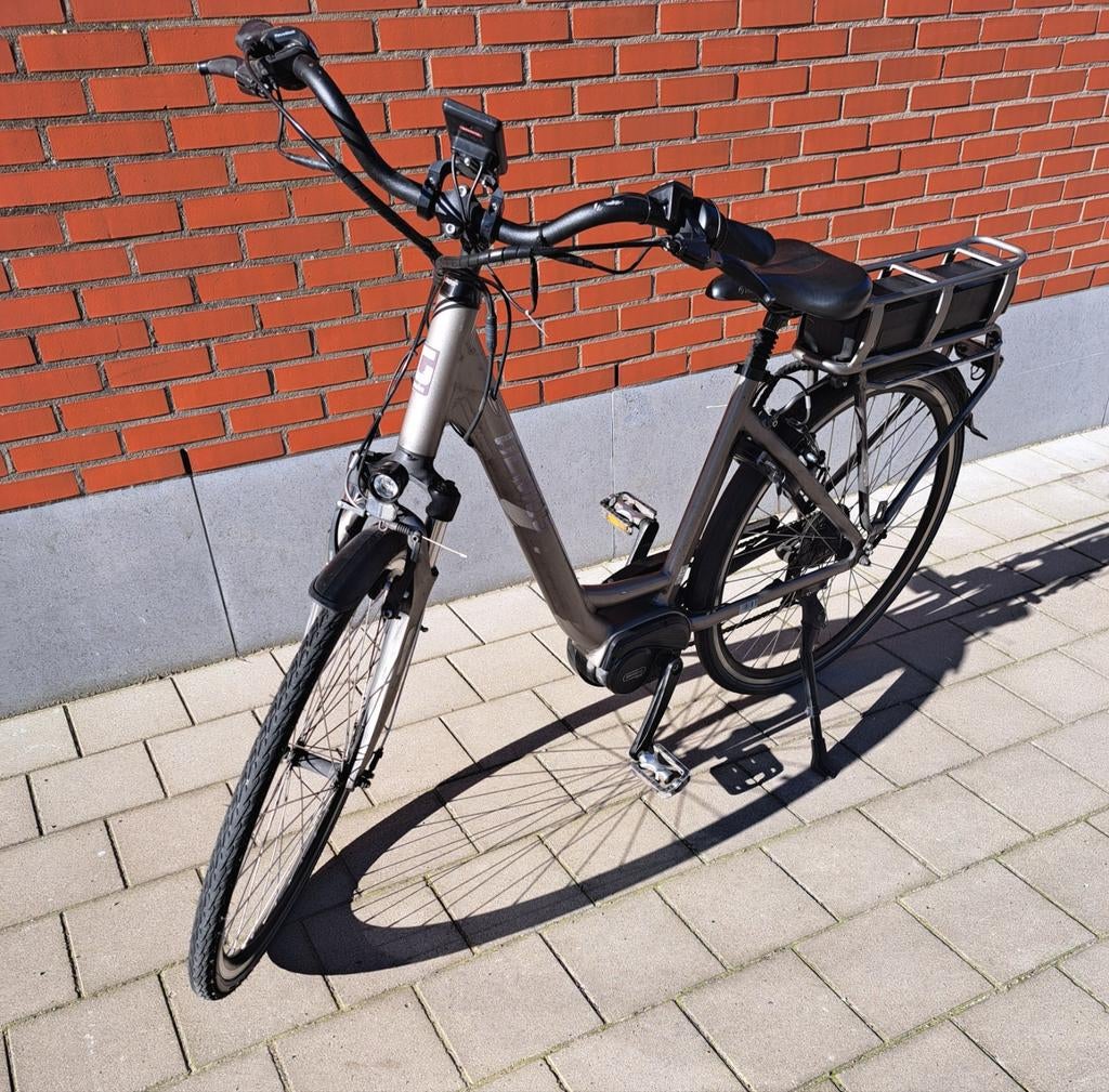 Elektrische fiets middenmotor in perfect staat, Fietsen en Brommers, Elektrische fietsen, Ophalen, Zo goed als nieuw, 50 km per accu of meer