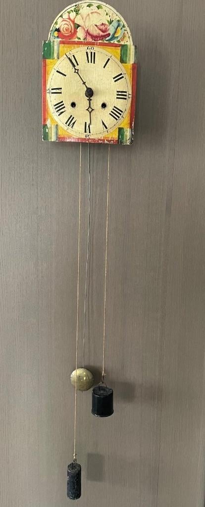 Antieke wandklok, Ophalen