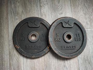 2 x 5kg Domyos halterschijven. (10kg) beschikbaar voor biedingen