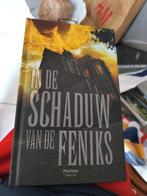 In de schaduw van de feniks, Boeken, Ophalen
