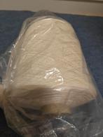 Klos garen mooi verpakt in plastic, Ophalen