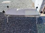 Smeedijzeren tafel., Ophalen