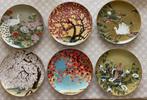 Twaalf Japanse porseleinen sierborden, 1979, Antiek en Kunst, Ophalen