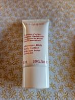 Clarins.  Nieuw.  Body lotion 30 ml., Ophalen of Verzenden, Nieuw, Bodylotion, Crème of Olie
