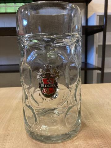 Grote glazen bierpotten Beck’s  beschikbaar voor biedingen