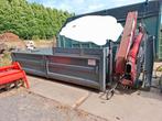 Haakcontainer met zijdeuren en kraan, Ophalen