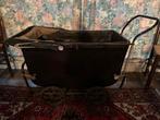 antieke kinderwagen of poppenwagen, Ophalen
