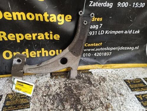 Draagarm links-voor van een Volkswagen Passat, Auto-onderdelen, Ophanging en Onderstel, Volkswagen, Gebruikt, 3 maanden garantie