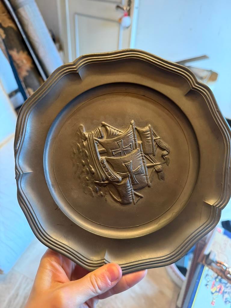 Tinnen schotel, Ophalen