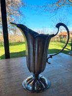 Tinnen kan/vaas, Enlèvement