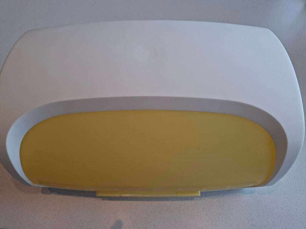 Tupperware broodtrommel, Ophalen