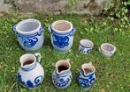 Set potten en kannen van aardewerk, Ophalen