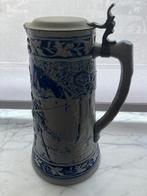 Bierkruik met blauw tafereel en deksel, Ophalen