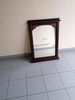 houten spiegel, Ophalen