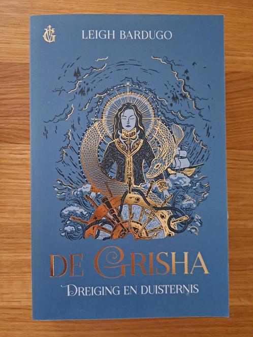 Leigh Bardugo - De Grisha. Dreiging en duisternis, Boeken, Kinderboeken | Jeugd | 13 jaar en ouder, Zo goed als nieuw, Ophalen of Verzenden