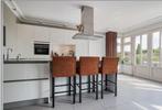 Moderne Witte Hoogglans Eilandkeuken – GreeploosGEDEMONTEERD