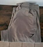 Gymshark joggingsbroek Maat: M licht kakki kleur, Kleding | Heren, Sportkleding, Ophalen of Verzenden, Zo goed als nieuw, Overige maten