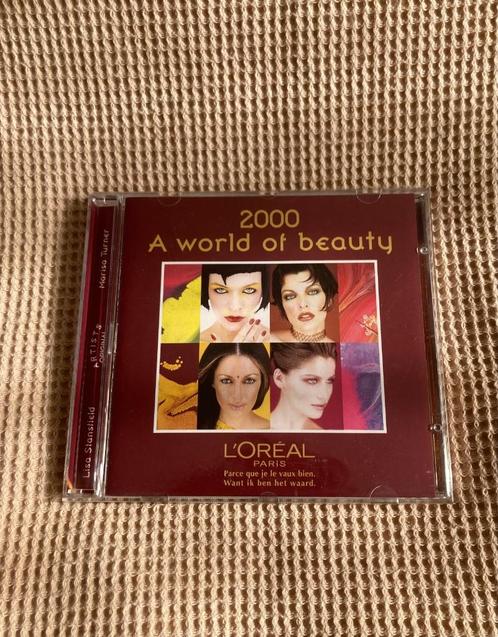 2000 a world of beauty L'Oréal Paris CD, CD & DVD, CD | Pop, Comme neuf, 2000 à nos jours, Enlèvement ou Envoi