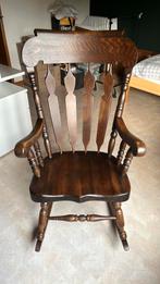 Houten schommelstoel, Ophalen