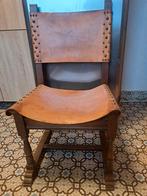Chaise en cuir et bois ancienne