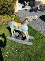 Cheval a bascule en bois, Ophalen