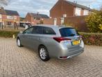 Toyota Auris Touring Sports 1.8 Hybrid Trend, Auto's, Automaat, 4 deurs, 4 cilinders, Leder en Stof