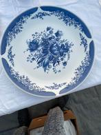 Blauw Delfts bord, Ophalen