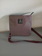 Tommy handtas, Ophalen