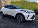 Toyota C-HR 1.8i VVT-i Hybrid C-Lub Bi-Tone E-CVT (bj 2023), Auto's, Automaat, Gebruikt, 4 cilinders, 72 kW