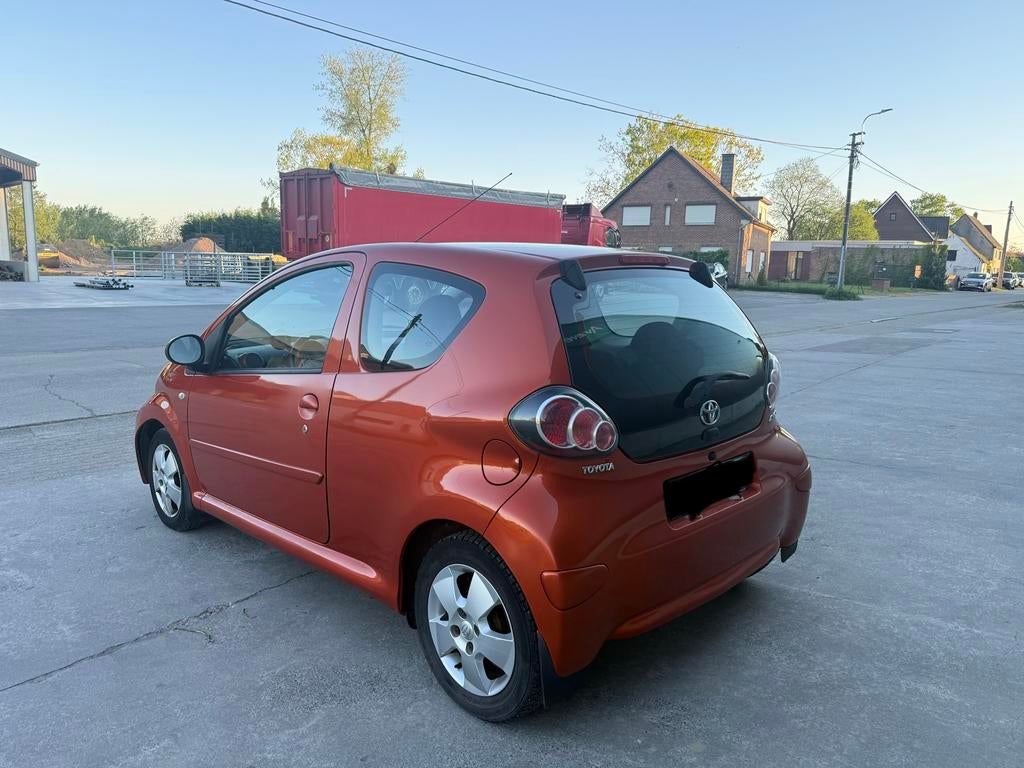 TOYOTA AYGO 1.0i ORANGE EDITION GEKEURD FACELIFT AIRCO ✅, Autos, Toyota, Euro 5, Achat, 998 cm³, Entreprise