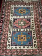 Handgeknoopt tapijt Kazak, Ophalen