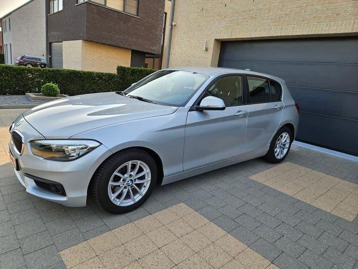 BMW 116i – 58.537 km – Goed onderhouden, Stof, Euro 6, Navigatiesysteem, Particulier