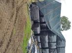 Hooi in plastic gewikkeld, Ophalen