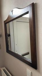 Spiegel met houten frame, Ophalen