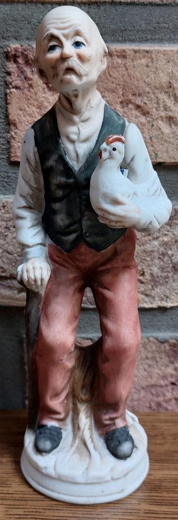 Biscuitporseleinen beeldje - Man met kip - Capodimonte beschikbaar voor biedingen