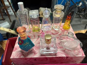 GRATIS lege parfumflesjes beschikbaar voor biedingen
