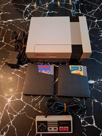 Nintendo Nes-console + 2 games + controller!  beschikbaar voor biedingen