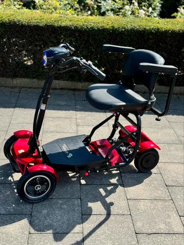 SCOOTER DE SÉCURITÉ ASSISI, ROUGE, PLIABLE SCOOTMOBIEL disponible aux enchères