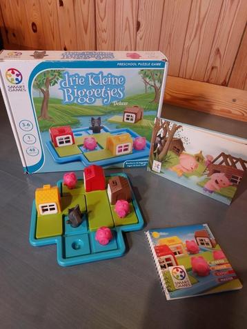 Spel Smart Games: drie kleine biggetjes - deluxe editie beschikbaar voor biedingen