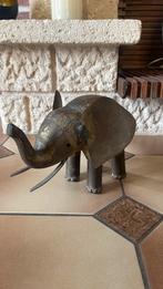 Standbeeld van een olifant, Ophalen