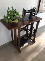 Decoratieve oude naaimachine, Ophalen
