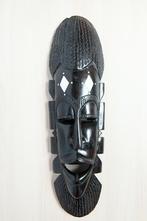 Afrikaans masker uit massief ebbenhout, Ophalen