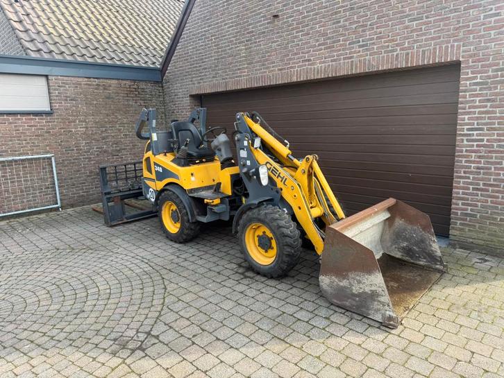 Kniklader Gehl AL340 (2400kg), Zakelijke goederen, Machines en Bouw | Kranen en Graafmachines, Wiellader of Shovel, Ophalen