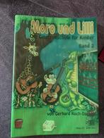 Livre cours de guitare Moro et Lilli. Bande 2, Comme neuf, Enlèvement ou Envoi