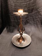 Verzilverde kandelaar, Enlèvement