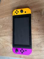 Nintendo Switch met kleurrijke controllers, Comme neuf, Enlèvement