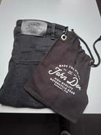 Jeansmotor broek vrouw, Ophalen